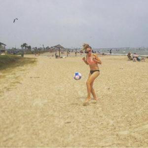 Molly playing around with a soccer ball